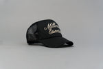 Load image into Gallery viewer, Luxury Script Millionaire Essentials Black Trucker Hat
