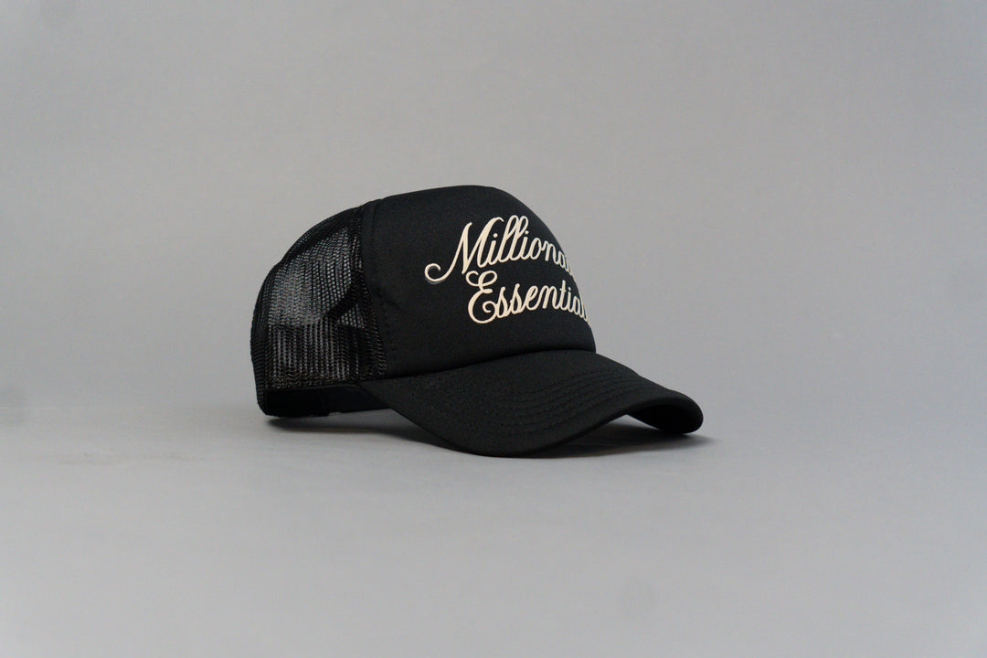 Luxury Script Millionaire Essentials Black Trucker Hat