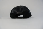 Load image into Gallery viewer, Luxury Script Millionaire Essentials Black Trucker Hat
