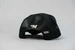 Load image into Gallery viewer, Staple Logo Millionaire Essentials Black Trucker Hat
