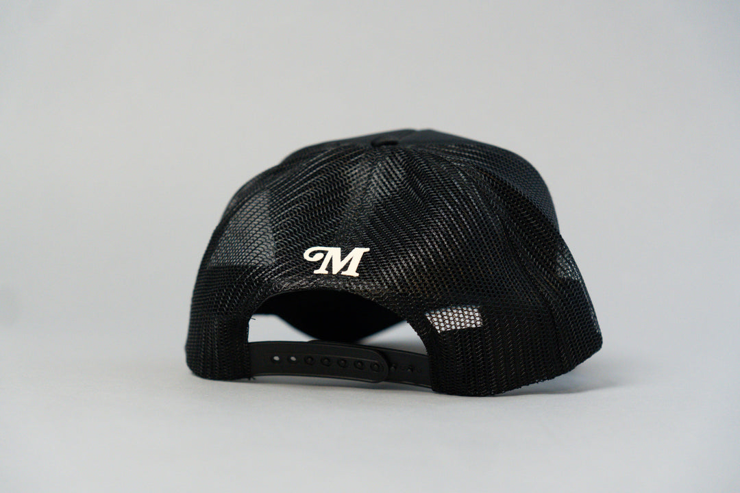 Staple Logo Millionaire Essentials Black Trucker Hat