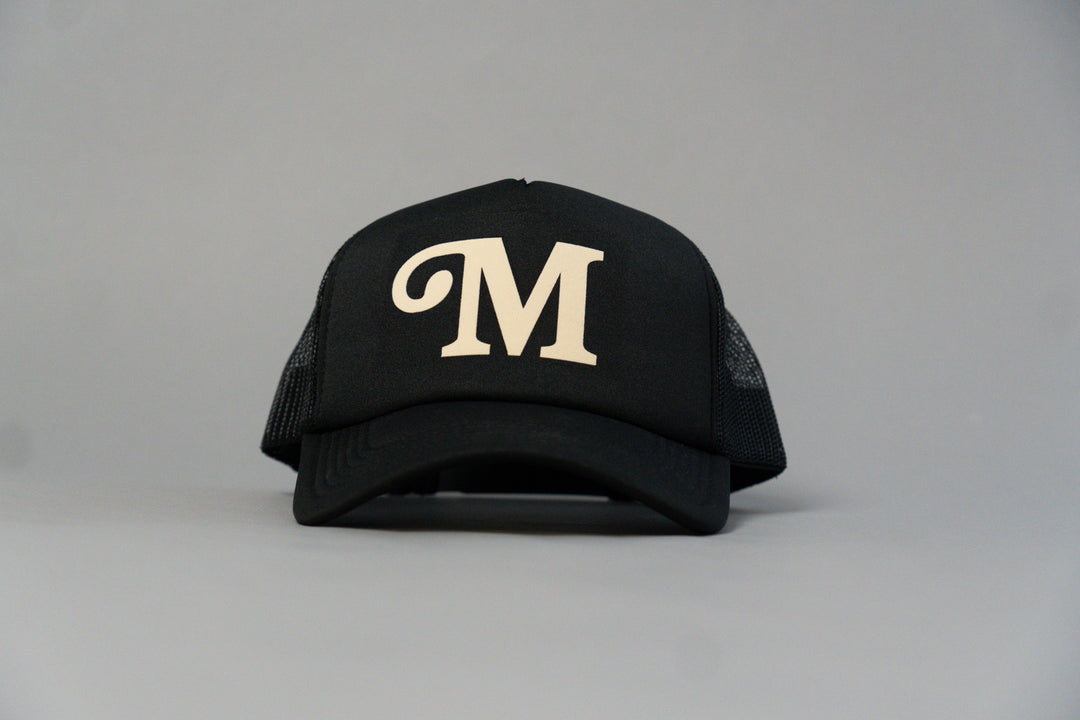 "M" Millionaire Essentials Black Trucker Hat