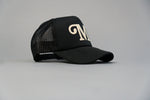 Load image into Gallery viewer, &quot;M&quot; Millionaire Essentials Black Trucker Hat
