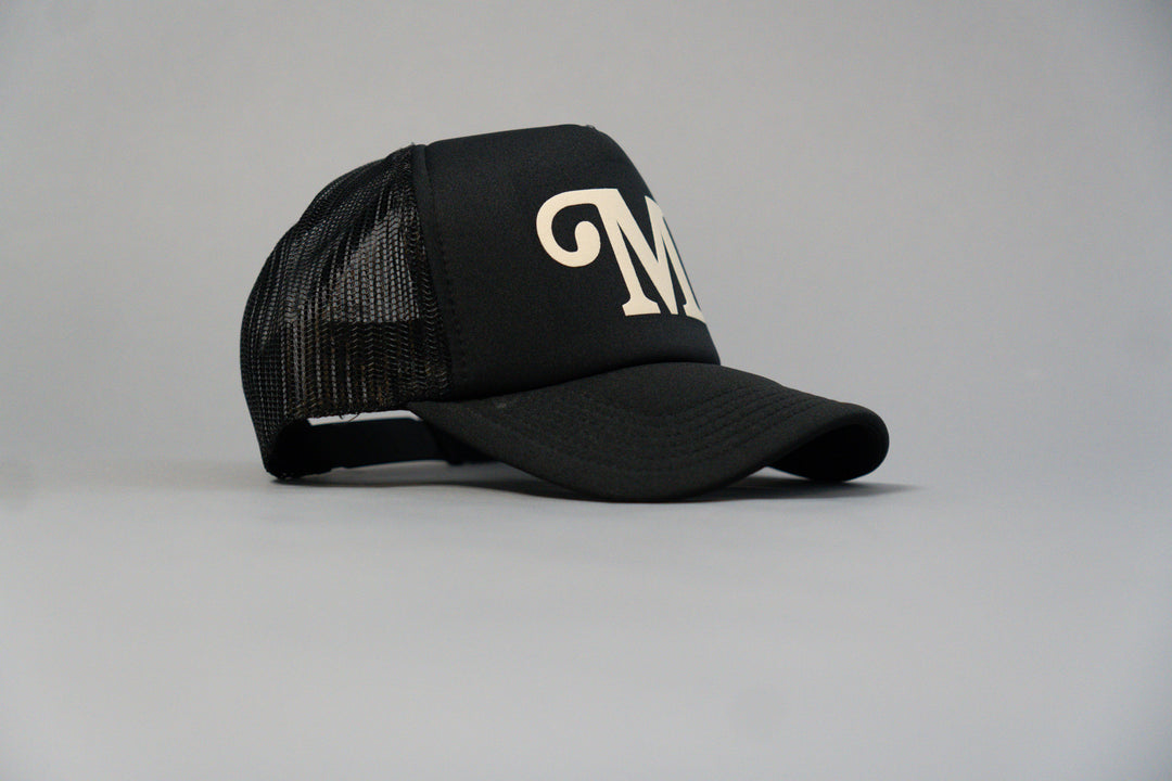 "M" Millionaire Essentials Black Trucker Hat