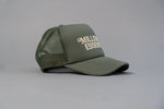 Load image into Gallery viewer, Staple Logo Millionaire Essentials Army Green Trucker Hat
